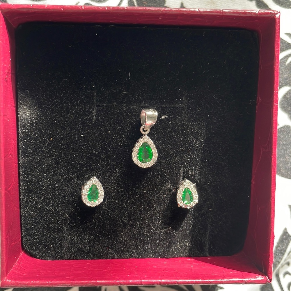 Sterling silver pendant and earring set.